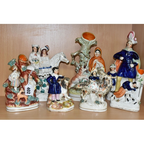 402 - SEVEN NINETEENTH CENTURY STAFFORDSHIRE FIGURES AND FIGURE GROUPS, comprising three flatback spill va... 