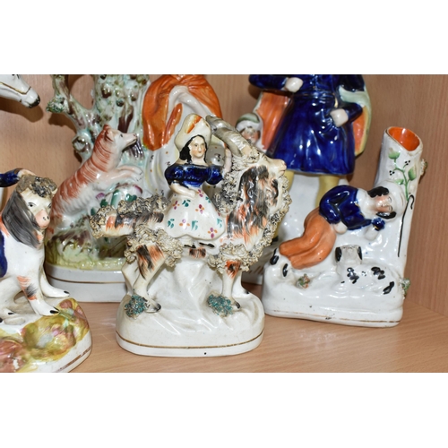 402 - SEVEN NINETEENTH CENTURY STAFFORDSHIRE FIGURES AND FIGURE GROUPS, comprising three flatback spill va... 