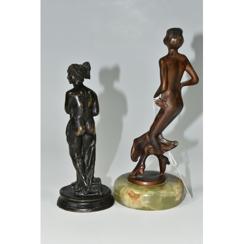 403 - TWO SMALL BRONZE FIGURINES, comprising a twentieth century figure of a woman, mounted to an onyx pli... 