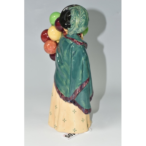 405 - A ROYAL DOULTON FIGURINE - 'THE BALLOON SELLER', model no HN583, issued 1923-1949, green printed bac... 