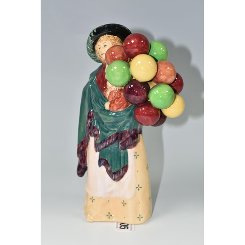 405 - A ROYAL DOULTON FIGURINE - 'THE BALLOON SELLER', model no HN583, issued 1923-1949, green printed bac... 