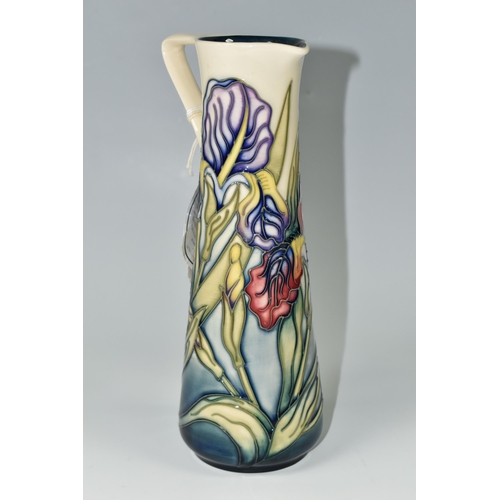 406 - A MOORCROFT POTTERY 'IRIS' JUG, of slender form with angular handle, tube lined with pink, yellow an... 