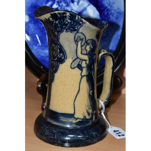 412 - A ROYAL DOULTON BLUE CHILDREN PLAQUE AND A MORRISIAN WARE JUG, the framed oval plaque decorated with... 