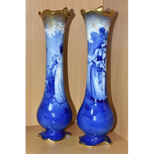 415 - A NEAR PAIR OF ROYAL DOULTON 'BLUE CHILDREN' VASES, of slender baluster form, with gilt scrolling mo... 