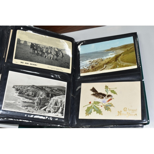 483 - POSTCARDS Two Albums and One Box containing approximately 550* miscellaneous Postcards from the earl... 