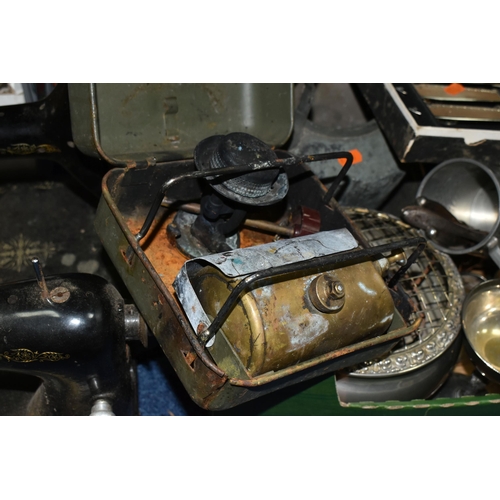 484 - FOUR BOXES OF METALWARE AND TWO SINGER SEWING MACHINES IN NEED OF RESTORATION, the boxes include sew... 