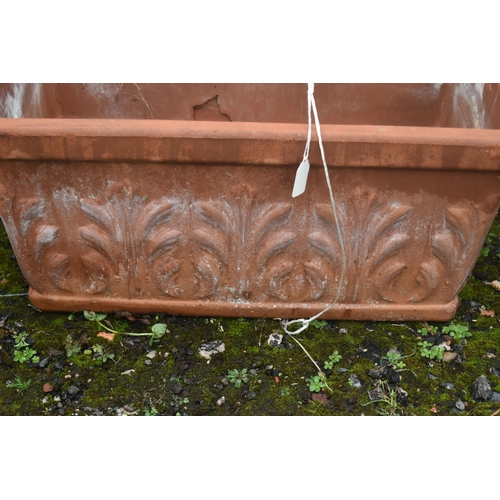 1008 - THREE ITALIAN TERRACOTTA RECTANGULAR GARDEN PLANTERS, with floral details, length 54cm x depth 30cm ... 