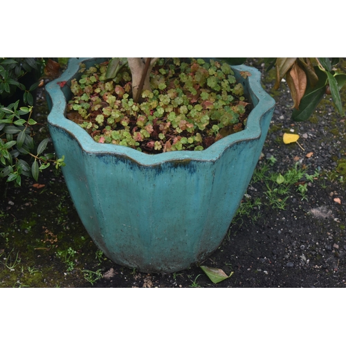 1012 - FIVE VARIOUS GLAZED GARDEN PLANT POTS, to include a teal plant pot with shaped edges, diameter 50cm ... 