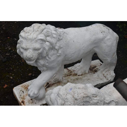 1013 - AN OPPOSING PAIR OF WHITE PAINTED COMPOSITE LIONS, with turned heads, and one front foot raised, len... 