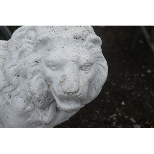 1013 - AN OPPOSING PAIR OF WHITE PAINTED COMPOSITE LIONS, with turned heads, and one front foot raised, len... 