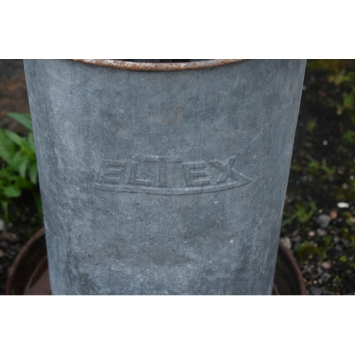 1015 - FOUR ELTEX GALVANISED CHICKEN FEEDERS, height approximately 70cm (condition report: rusty finish, so... 