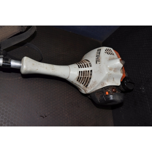 1051 - A STIHL FS 55 PERTOL STRIMMER, and a Stihl 200T petrol chainsaw (condition: strimmer engine pulls fr... 