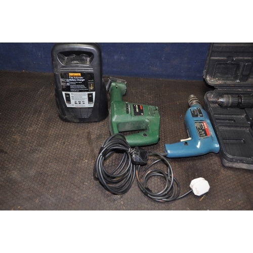 1059 - A PERFOMANCE 30 VOLT HAMMER DRILL, with two batteries and charger, a Bosch CSB 500-2, a Bosch PFZ  5... 