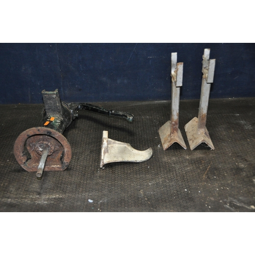 1068 - A VINTAGE CAST IRON PUMP, two bespoke metal stands, and a cast metal wall hanging item, labelled 7 1... 