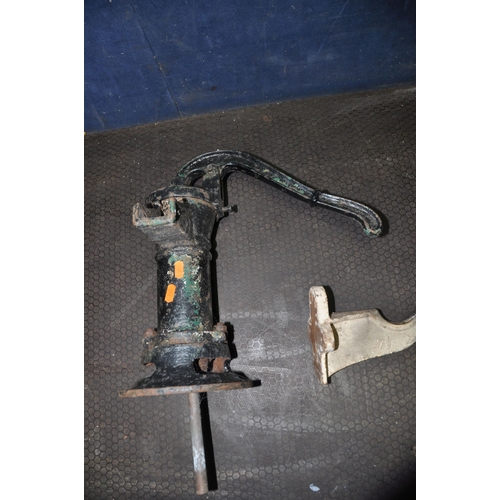 1068 - A VINTAGE CAST IRON PUMP, two bespoke metal stands, and a cast metal wall hanging item, labelled 7 1... 