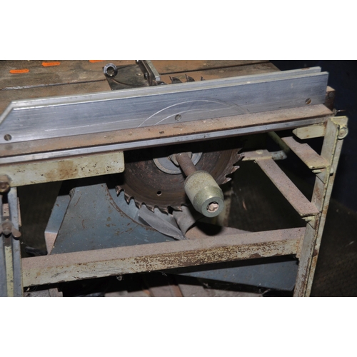 1072 - AN UNBRANDED BELT DRIVEN TABLE SAW, and stand (condition: untested due to uninsulated cable, signs o... 