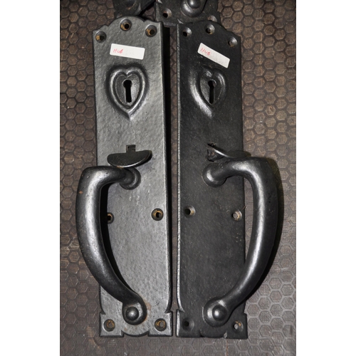 1078 - TWO PAIRS OF CAST IRON DOOR HANDLES, with thumb latch and boobbyer locking mechanism, both with keys