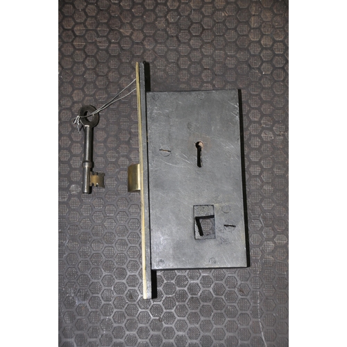 1078 - TWO PAIRS OF CAST IRON DOOR HANDLES, with thumb latch and boobbyer locking mechanism, both with keys