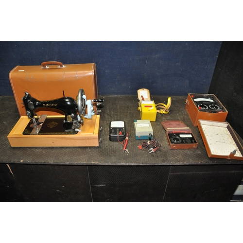 1079 - A LEATHER CASED MANUAL SINGER SEWING MACHINE, serial number 15 040 687, an Avometer 8 in original ca... 