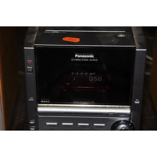 1081 - A PANASONIC SA-PM18 MINI STEREO SYSTEM, with tape player, radio and 5 cd changer (condition: PAT pas... 