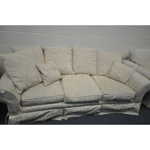 1202 - A FLORAL CREAM THREE PIECE LOUNGE SUITE, comprising a three seater settee, 230cm x depth 100cm x hei... 