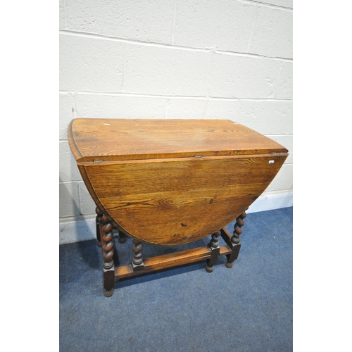 1219 - AN OAK BLANKET CHEST, width 144cm x depth 44cm x height 42cm, along with an oak barley twist gate le... 