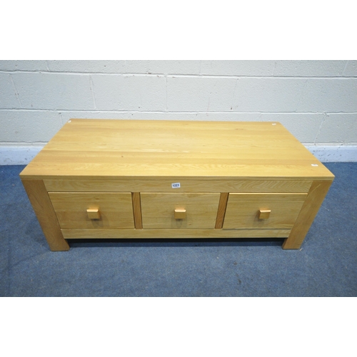 1221 - A LIGHT OAK COFFEE TABLE, with six drawers, width 118cm x depth 56cm x height 43cm (condition report... 