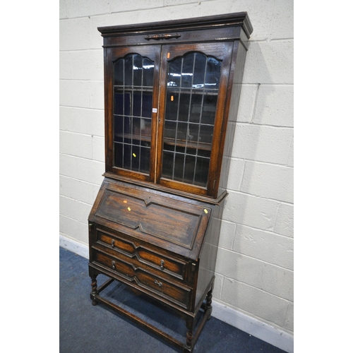 1223 - AN EARLY 20TH CENTURY BUREAU BOOKCASE, width 91cm x depth 41cm x height 202cm x height of base 106cm... 