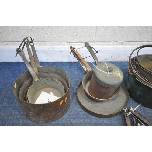 1234 - A LARGE SELECTION OF COPPER PANS AND SINGLE HANDLE BUCKETS, of various styles and sizes, along with ... 