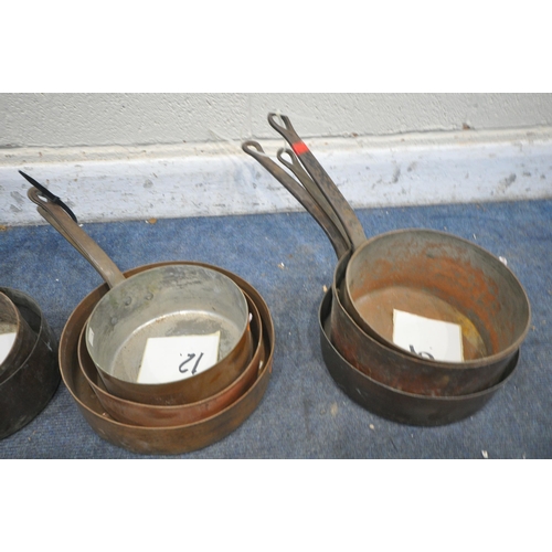 1234 - A LARGE SELECTION OF COPPER PANS AND SINGLE HANDLE BUCKETS, of various styles and sizes, along with ... 