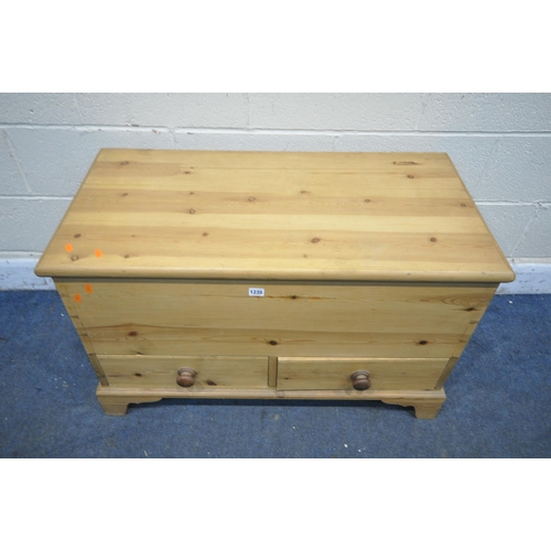 1235 - A PINE BLANKET CHEST, with two drawers, width 95cm x depth 48cm x height 59cm (condition report: spl... 