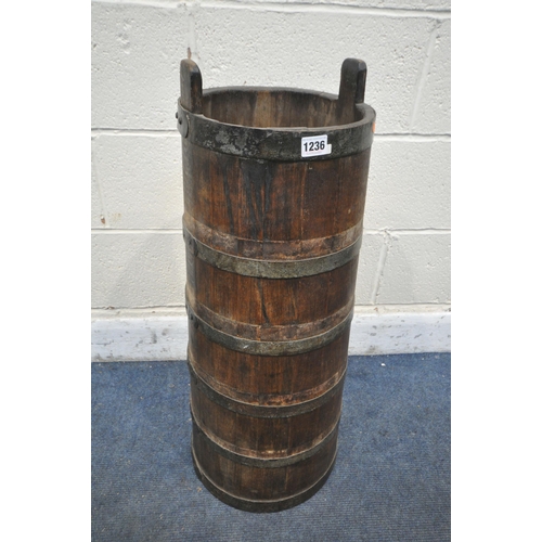 1236 - AN OAK COOPERED BARREL STICK STAND, with iron banding, diameter 33cm x height 87cm (condition report... 