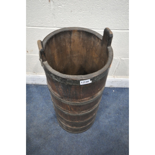 1236 - AN OAK COOPERED BARREL STICK STAND, with iron banding, diameter 33cm x height 87cm (condition report... 