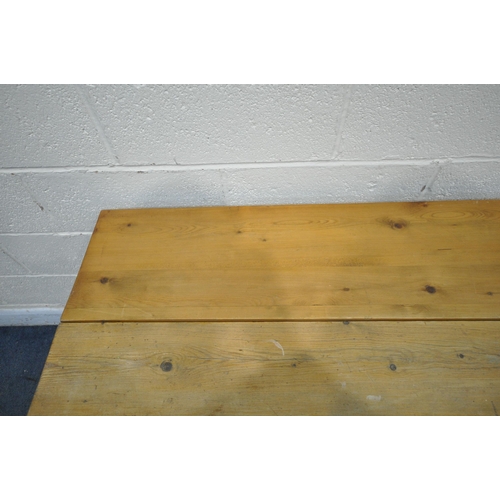 1240 - A VICTORIAN STYLE PINE TABLE, with a drop leaf, and two drawers, on turned legs, width 107cm x depth... 