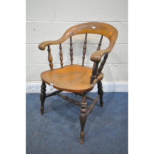 1241 - A 19TH CENTURY ELM DESK ARMCHAIR, with turned spindles, and stretchers (condition report: aged wear ... 