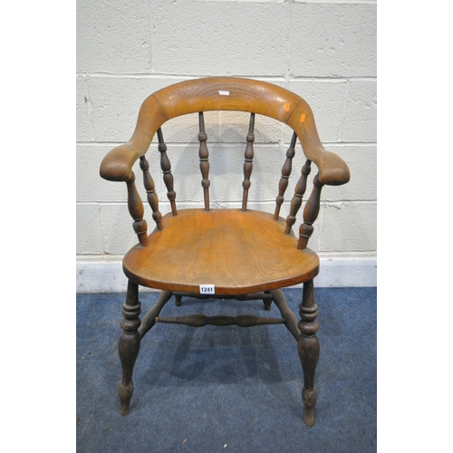 1241 - A 19TH CENTURY ELM DESK ARMCHAIR, with turned spindles, and stretchers (condition report: aged wear ... 