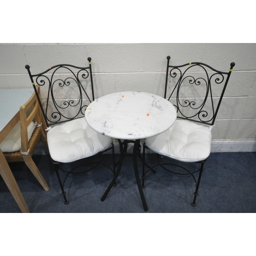 1255 - A WROUGHT IRON CIRCULAR MARBLE TOP TABLE, diameter 60cm x height 74cm, two chairs, and a beech glass... 