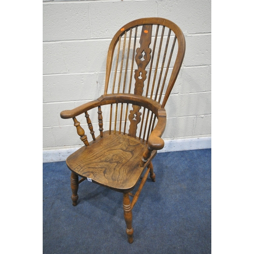 1260 - AN ELM AND BEECH HOOP BACK ARMCHAIR, with a pierced splat back, width 67cm x depth 67cm x height 120... 