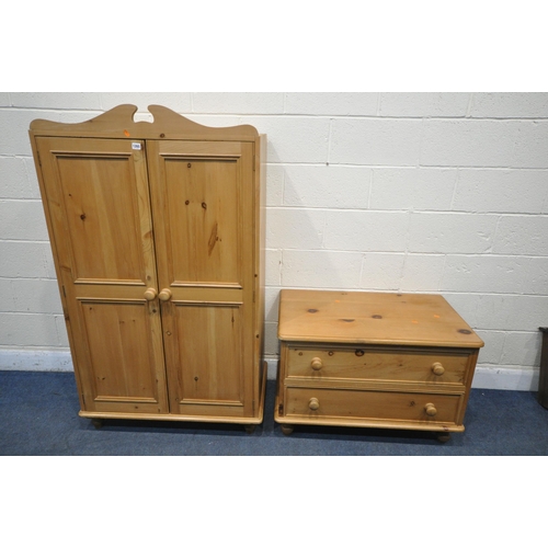 1265 - A MODERN PINE TWO DOOR WARDROBE, width 84cm x depth 54cm x height 182cm, and a matching chest of fou... 