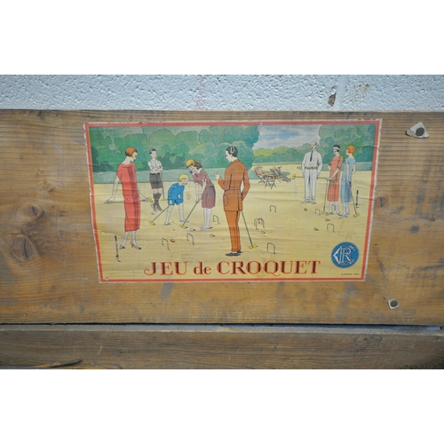 1280 - A VINTAGE PINE BOXED CROQUET SET, the lid reading Jeu De Croquet, width 102cm x depth 29cm x height ... 