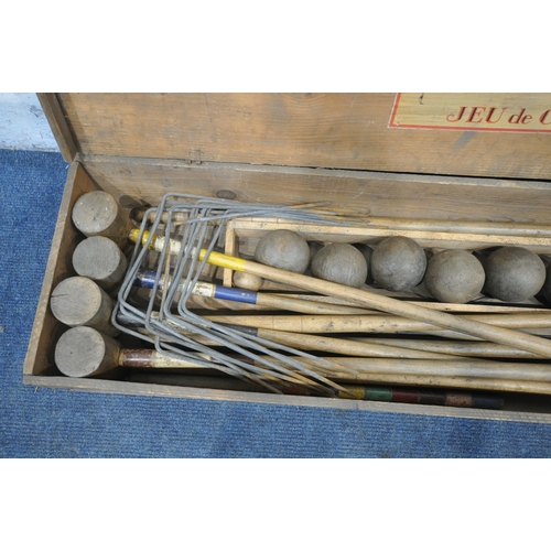 1280 - A VINTAGE PINE BOXED CROQUET SET, the lid reading Jeu De Croquet, width 102cm x depth 29cm x height ... 