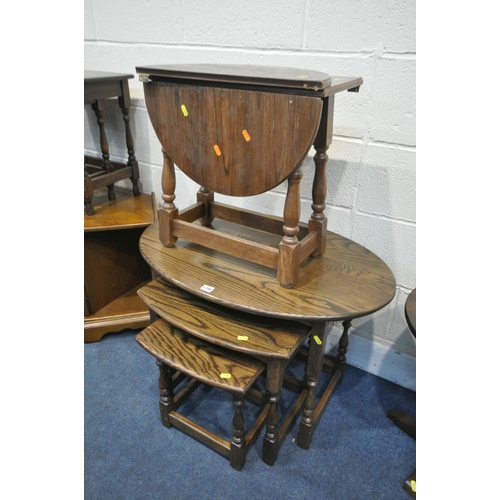 1296 - A SELECTION OF OAK OCCASIONAL FURNITURE, to include an oval nest of three tables, corner tv stand, n... 