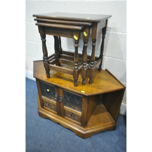 1296 - A SELECTION OF OAK OCCASIONAL FURNITURE, to include an oval nest of three tables, corner tv stand, n... 