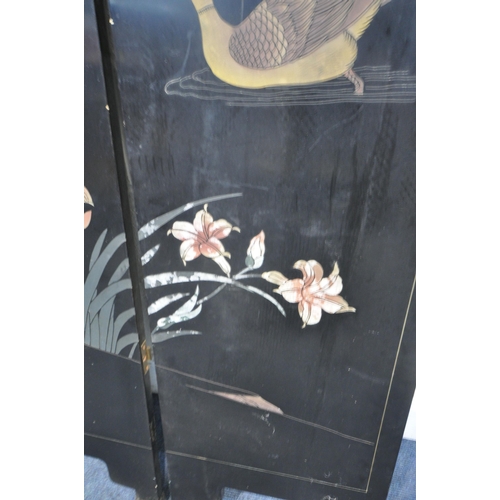 1322 - A BLACK LAQUERED ORIENTAL SIX FOLDING SCREEN, each side showing a different chinoiserie image, each ... 