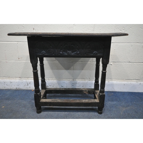 1339 - A GEORGIAN CARVED OAK RECTANGULAR TABLE, with a lunette carved frieze, united by a box stretcher, wi... 