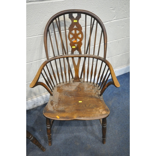 1341 - A PAIR EARLY 20TH CENTURY ELM AND BEECH WINDSOR ARMCHAIRS, the spindled hoop back with a wheel back ... 