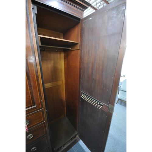 1351 - AN EDWARDIAN MAHOGANY COMPACTUM WARDROBE, with two mirrored doors, flanking two cupboard doors, abov... 