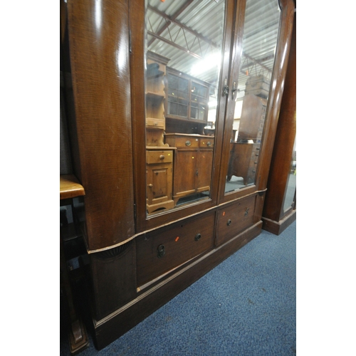 1352 - AN EDWARDIAN MAHOGANY DOUBLE DOOR WARDROBE, with mirrored doors, above two drawers, width 162cm x de... 