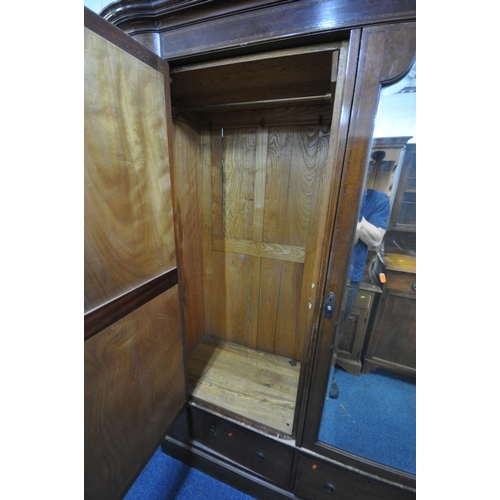 1352 - AN EDWARDIAN MAHOGANY DOUBLE DOOR WARDROBE, with mirrored doors, above two drawers, width 162cm x de... 