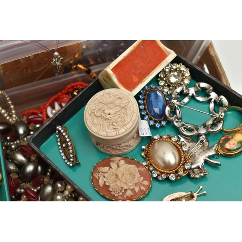 10 - A BOX OF ASSORTED COSTUME JEWELLERY, to include a selection of brooches, beaded necklaces, fashion w... 